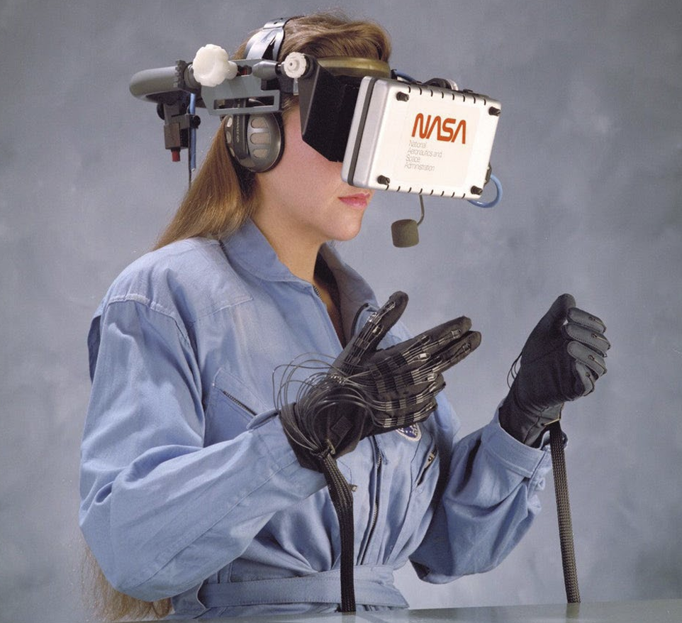 The photo above shows a NASA employee in the early 90’s using a VR headset for simulation based training. NASA Ames Research. (1990). Virtual Reality + 3D Internet [Photograph].